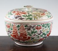 A Chinese famille verte bowl and cover, Kangxi period, the U shaped bowl and domed cover decorated