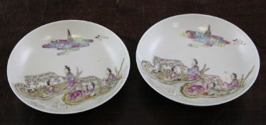 A pair of Chinese famille rose saucer dishes, 19th century, each painted with female immortals in