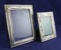 Two 1990`s repousse silver photograph frames, Carr`s of Sheffield, Sheffield, 1991 and Harrods