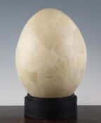 A Madagascan elephant bird egg, reconstructed in sections from several eggs, 1.35in. Starting Price: