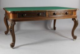 A Victorian walnut library table, fitted four frieze drawers, bun handles on carved cabriole legs