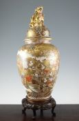 A large Japanese Satsuma pottery ovoid vase and cover, early 20th century, each decorated with