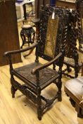 A 17th century carved walnut elbow chair, with barley twist supports and cane back, together with