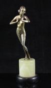 Josef Lorenzl (1892-1950). An Art Deco silvered bronze figure of a standing woman, on circular green