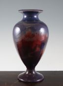 A rare experimental Moorcroft flambe `fish` vase, c.1915, of baluster shape, decorated with five