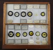 A Victorian mahogany microscope slide cabinet, with glazed door and thirteen sliding trays, 8.