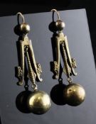 A pair of Victorian gold drop earrings, with beaded shaft and graduated globe terminals, gross 5.1