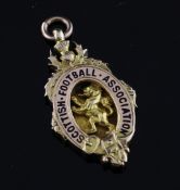 A 9ct gold Scottish Football Association medal to Airdrieonians FC, J.McDougall, 1923-24. 21.6g