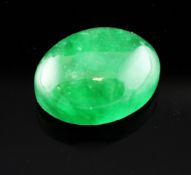 An unmounted jadeite cabochon, 0.5in. Starting Price: £1600