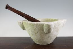 A late 19th / early 20th century circular marble mortar, together with a turned hardwood pestle