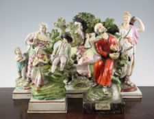 Five Pearlware figures or groups, c.1820-30, all modelled with tree stumps and square bases,