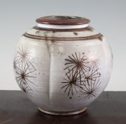 Alan Caiger-Smith (1930-). A lustre lobed globular vase, decorated with needle like fronds on a