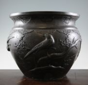 A large Japanese bronze jardiniere, early 20th century, cast in relief with pheasants and other
