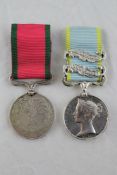 An 1854 Crimea medal with Sebastopol and Inkermann clasps to Corpl J.Hart 4th Regt and a Turkish