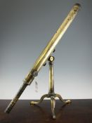A 19th century brass telescope by Fraser, Bond Street, London, on a tripod stand, overall 3ft 2in.