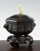 A Chinese bronze hexagonal censer, 17th / 18th century, cast in relief with a band of taotie and