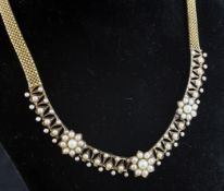 A gold mesh and split pearl set fringe necklace, of foliate design, 15.75in. Starting Price: £240