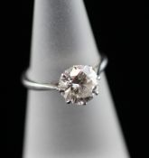 A platinum set solitaire diamond ring, the round brilliant cut stone approximately 1.65ct, size J