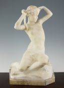 A late 19th century carved alabaster figure of a seated young girl, holding a garland of flowers