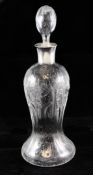 A Thomas Webb rock crystal glass and silver collared decanter and stopper, c.1903, the baluster