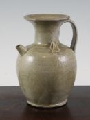 A Chinese Yueyao ewer, Song Dynasty, of ovoid form, the shoulder applied with two small lug