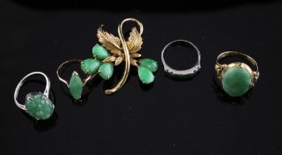 A 14ct gold and jadeite set brooch, of foliate design, 1.5in, together with four jadeite set dress