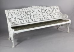 A pair of Coalbrookdale Nasturtium pattern garden benches, painted white with slatted seats, 6ft