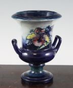 A Moorcroft `Orchid` campana vase, c.1928-49, with graduated cobalt blue ground, inscribed `W