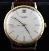 A gentleman`s late 1950`s/early 1960`s 18ct gold Longines automatic wrist watch, with baton numerals