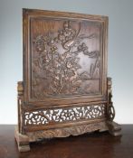 A Chinese carved wood table screen and stand, the panel carved in relief with pheasants amid