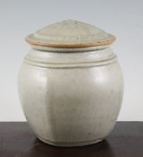 Richard Batterham (1936-). An ash glazed stoneware jar and cover, with lobed decoration to four