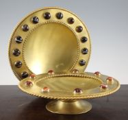 A late Victorian circular ormolu tazza, mounted with cabochon agate stones and ropetwist borders,