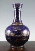 A Chinese gilt-decorated blue ground bottle vase, Guangxu mark but later, decorated with confronting
