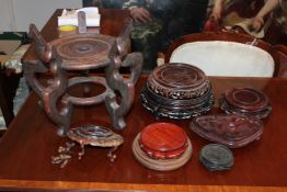 A box of Chinese wood stands Starting Price: £80