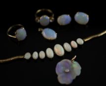 A 9ct gold and graduated white opal set bracelet, and six other pieces of opal jewellery including