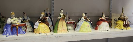 A set of twelve Royal Doulton figures of lady musicians, limited edition, comprising Viola HN2797,
