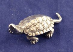 A Japanese silver miniature model of a terrapin, signed on stomach, 2in. Starting Price: £80