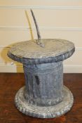 A small lead sun dial, with fluted column and circular base, W.9.5in. Starting Price: £160