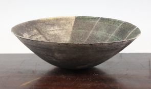 A Studio stoneware bowl, with green, white, brown and metallic striped glazes, monogram A.P? 12.