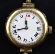 A lady`s early 20th century 18ct gold manual wind wrist watch, with circular Roman dial, no strap.