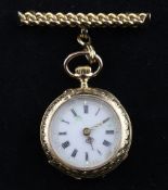 A lady`s Swiss 18ct gold keyless fob watch, with Roman dial and foliate engraved case, suspended