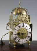 John Fordham of Dunmow. A 17th century brass lantern clock, with silvered Roman chapter ring, signed