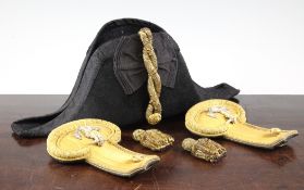 A 19th century Royal Navy Bicorn hat, together with a pair of gold thread Royal Navy epaulettes,