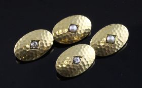 A pair of planished 18ct gold, diamond and split pearl set cufflinks, of oval form, gross 12.8