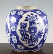 A large Chinese blue and white ovoid jar, late 19th century painted with reserves of antiques, on