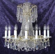 A Victorian style sixteen light bag chandelier, with pendant drops, 28in. Starting Price: £480