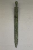 A Chinese bronze sword, c.300 A.D., 22in. Starting Price: £160