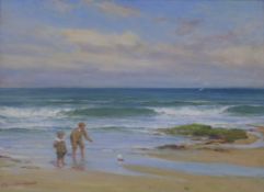 James Michael Brown (1854-1957)oil on canvas,Boys with a toy boat on the seashore,signed,11 x