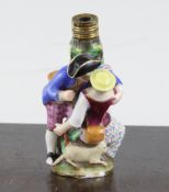 A Meissen figural scent bottle, late 19th century modelled with an amorous couple, underglaze blue