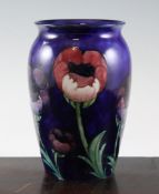 A Moorcroft `Big Poppy` ovoid vase, c.1925, on cobalt blue ground, inscribed `W Moorcroft` mark,